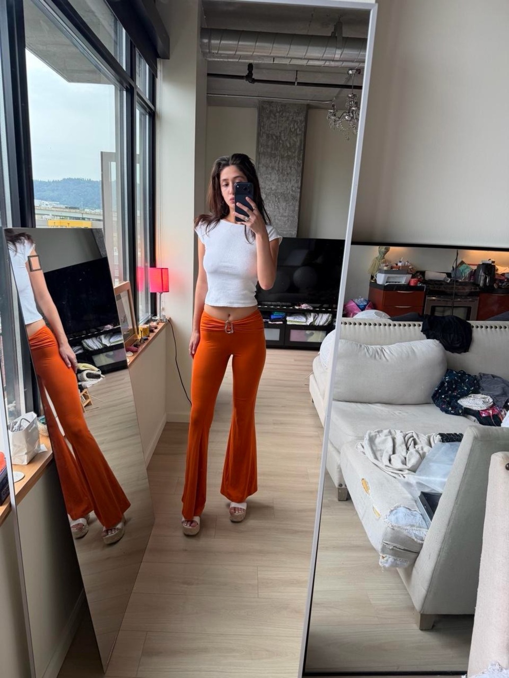 Fashion Nova Orange Flare Pants with silver buckle
